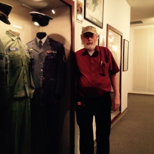 Ronnie at Veteran's Museum w Dad's Uniform